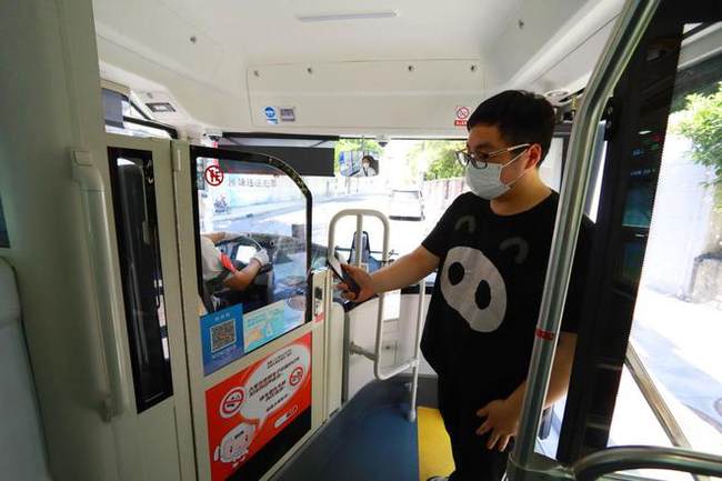 Fotas Zhu Xingxin el China Daily