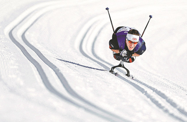 Αθλητές από το εσωτερικό και το εξωτερικό έχουν επιδείξει εντυπωσιακές επιδόσεις στον πάγο και το χιόνι κατά τη διάρκεια του πρώτου μισού των Χειμερινών Παραολυμπιακών Αγώνων του Πεκίνου 2022. [Φωτογραφία/Πρακτορεία]